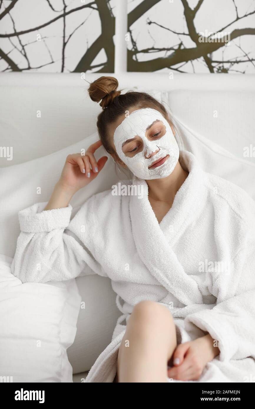 Woman relaxing with face mask