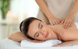 What is the average cost per client for massage day spas?